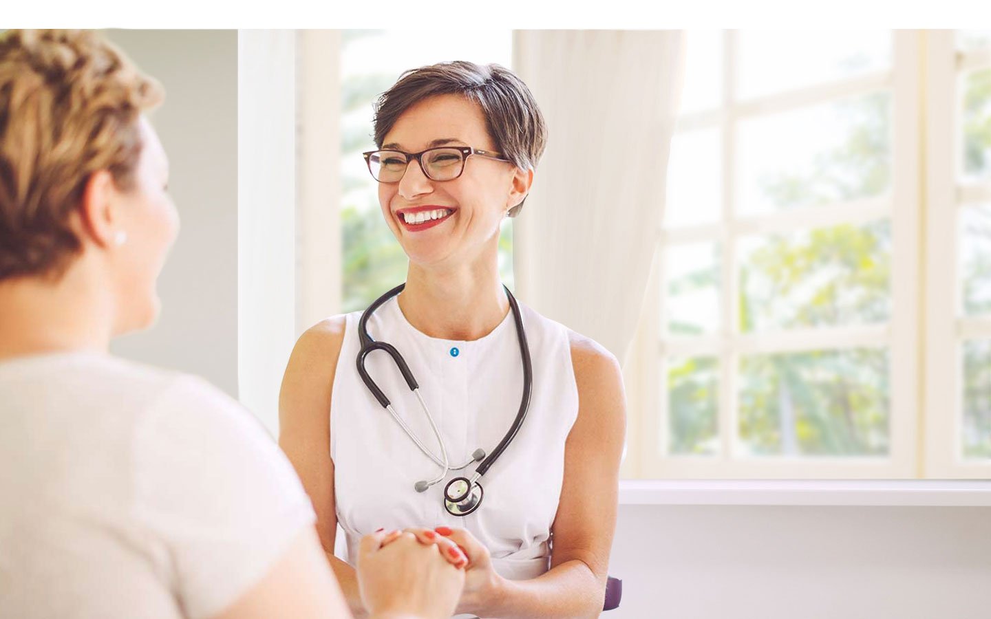 doctor talking with patient